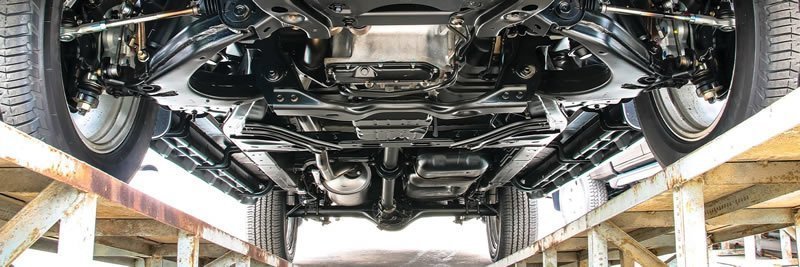Close-up of a car headlight being polished